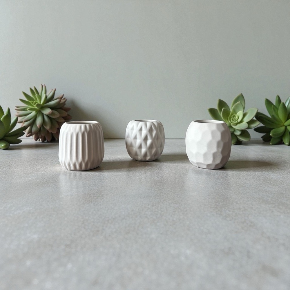Set of Three Textured White Ceramic Vases